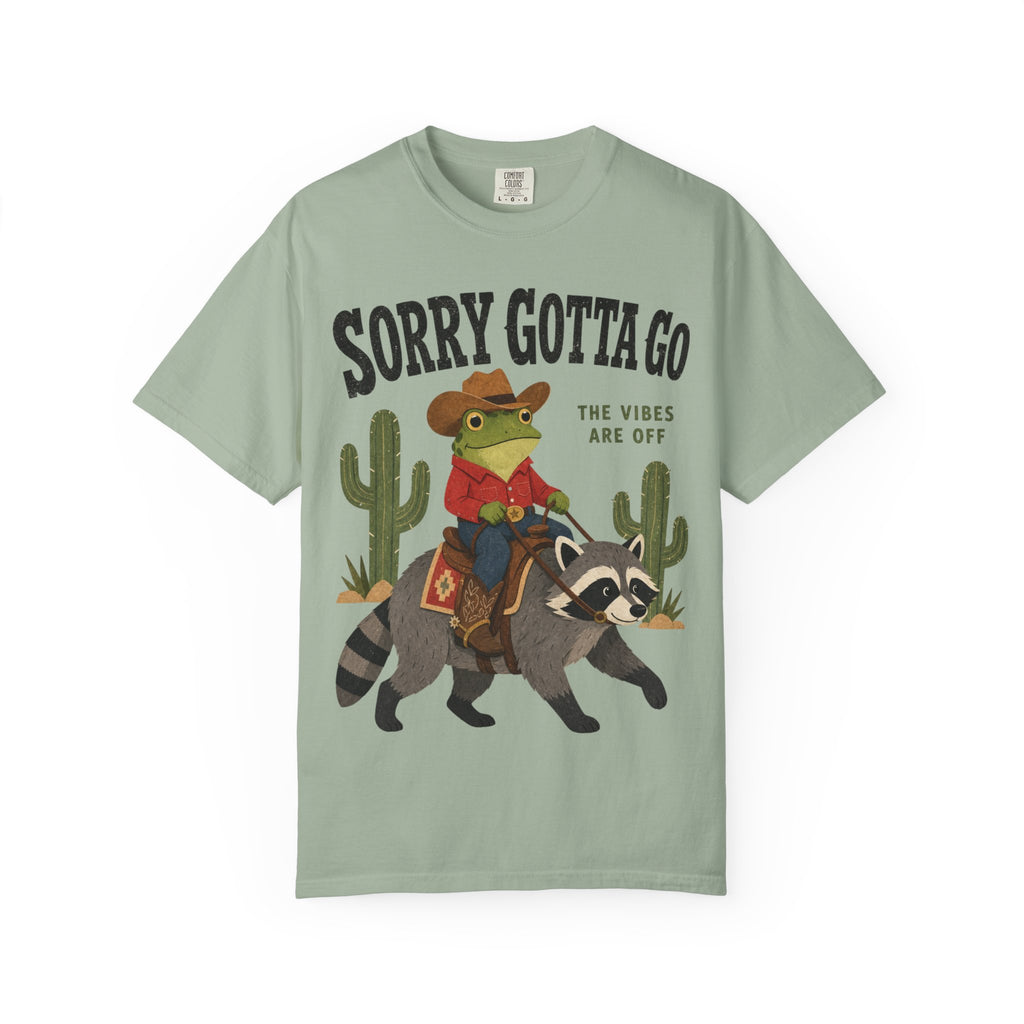 Sorry Gotta Go T-Shirt — Cowboy Frog Riding Raccoon (The Vibes Are Off)